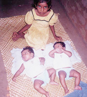 No money for their milk, the twins' mother Ajantha weeps
