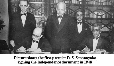 Picture shows the first premier D. S. Senanayaka signing the Independence document in 1948
