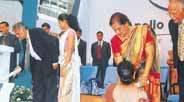 If they work together, they could also light up the lives of all Sri Lankans. That is the responsibility entrusted to President Chandrika Kumaratunga and Prime Minister Ranil Wickremesinghe by the people of this country. As though symbolising this joint responsibility, the two leaders lit traditional lamps simultaneously at the opening ceremony of the Apollo Hospital in Colombo on Friday. Apollo chairman Pratab Reddy (extreme right) is also in the picture. Pic by Gemunu Wellage