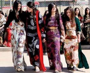 Iraqi students wearing traditional Kurdish clothing celebrate International Women's Day in Arbil, the capital of Kurdistan.