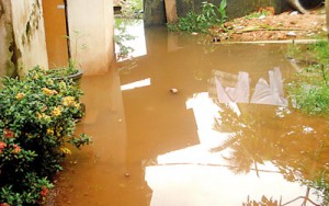 Villagers believe  the construction of cement walls in the area block water ways