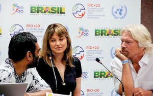 Executive Director of Greenpeace International Kumi Naidoo (L) actress Lucy Lawless (C) and entrepreneur Richard Branson take part in a Greenpeace press conference at the Rio+20 UN conference on sustainable development in Rio de Janeiro, Brazil on June 21. Greenpeace announced several celebrities had joined a campaign for a "global sanctuary" around the North Pole (AFP)