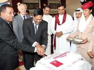 Picture shows  Emirates Divisional Senior Vice President Mohammed Mattar (extreme left) and Chairman of Airport & Aviation Services Prasanna Wickramasuriya cut a cake at the opening of the Emirates Lounge at the Bandaranaike International Airport as (from left)  President Emirates airline Tim Clark, Minister of Civil Aviation Priyankara Jayaratne, Minister of Economic Development Basil Rajapaksa and the UAE Ambassador to Sri Lanka H.E. Mahmood Mohammed Al-Mahmood look on.