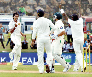 Lankans celebrating a dismissal.