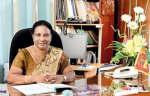 Badra Kamaladasa at her office after assuming duties at a simple ceremony. Pic by M.A. Pushpa Kumara