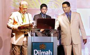 Merril J Fernando and his two sons - Malik (centre) and Dilhan at a Dilmah Distributors Conference a few years ago.