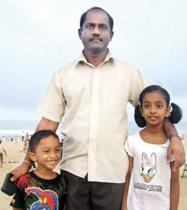 Glad they were spared: Dr.  Aathavan with his children