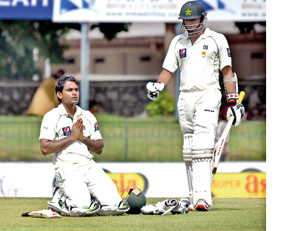 Mohammed Hafeez prays after reaching his century