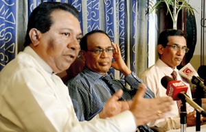S. B. Dissanayake and Prof. Samaranayake at the news conference