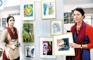 The students attend art classes run by Australian Dena Lawrence (pictured right)