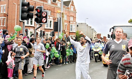 Up went the torch, so did the cheers