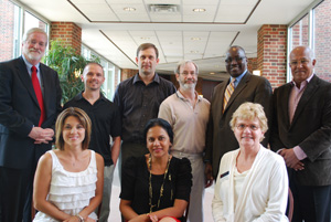 standing L-R:Alton Newell - Vice President for Enrollment,Professor Michael Leonard(Chemistry),Professor Matthew North(Computing and Information Studies),Professor Michael Pettersen(Physics), Professor Misawa Buba (Political Science) and Padmasena Dissanayake Seated L-R: Professor Tiffani Gottschall (Economics), Priyanthi Dissanayake and Roberta A. Cross (Director of Career Services) Photo by: Robert Reid (Communications Manager)