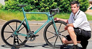 Project manager Simon Roberts poses with the new Aston Martin super cycle, which comes with a 25,000 price tag. Dubbed the 'world's most technologically advanced' bike, the elegant One-77 was based on the firm's 1 million namesake supercar and was launched earlier this month