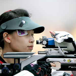 China's Yi Siling competes during the 10m Air Rifle Women qualification at the London 2012 Olympic Games at the Royal Artillery Barracks in London, July 28, 2012. AFP