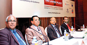 Picture shows from left - B Swaminathan - President, Enterprising Fairs(India) Pvt Ltd; Anver Dole - Vice President, Plastics and Rubber Institute of Sri Lanka; Kirthi Wanasinghe - President, Plastics and Rubber Institute of Sri Lanka and Bandula Sarath Kumara - Project Director- NPCPWM Project, CEA.