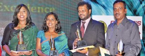 Doing the Sunday Times proud:  From left- Winner of the Upali Wijewardena Feature Writer of the Year Nadia Fazlul-Haq, the B.A. Siriwardena Columnist of the Year (English) Chandani Kirinde, Aruna Wickramarachchi with the award for the Best Designed Newspaper and Anthony David, with the Scoop of the Year award