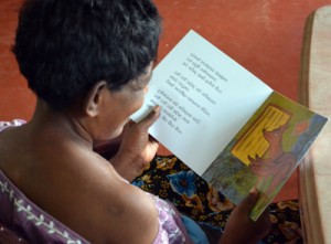 A resident engrossed in the beautiful world of a picture story book. Pix by Hasitha Kulasekera