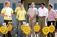 FILE PHOTO: Jayalath Jayawardena, MP with his sirens during the 2004 tsunami. He is flanked by A. Thiagaraja, then LTTE co-ordinator for NGOs and LTTE spokesman Daya Master. On his right are three German volunteers.