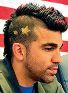 Star quality: Nasa engineer Bobak Ferdowsi, part of the team behind the Mars Curiosity landing, became an Internet sensation when a picture of him with stars shaved into the side of his head was beamed around the world