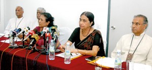 Members of Friday Forum at the news conference. Pic by Nilan Maligaspe