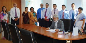File photo shows Mr Karunaratne on the day he assumed duties