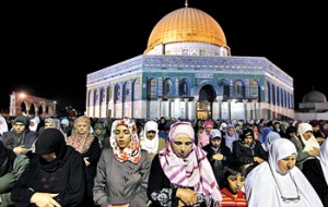 Palestinian women pray in front of the Dome of the Rock, on the compound known to Muslims as al-Haram al-Sharif (Noble Sanctuary) and to Jews as Temple Mount, during Laylat ul-Qadr in Jerusalem’s Old City. AFP