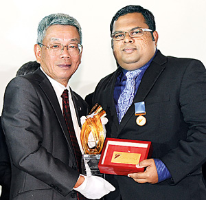 Picture shows Ravindra Soysa, Founder and Chairman of Civimech Group receiving the award.