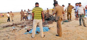 Police and area residents at the scene of the tragedy