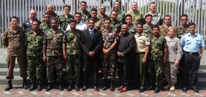 CICRA Director/CEO Boshan Dayaratne and Master Trainer Krishnan Rajagopal with a group of top military officers representing member nations of the Multinational Communications Interoperability Programme)) at the Cyber Endeavor Programme on August 16 at Changi Control and Command Centre of the Singapore Naval Base.
