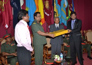 Handingover Laptop to Commander