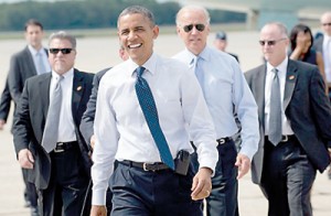 President Obama and Vice President Joe Biden back on the campaign (AFP)