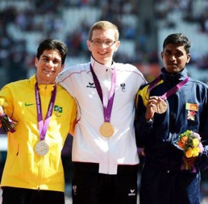 Pradep Sanjaya (Right) with God Medallist Gunther Matzinger of Austria (Center)  and Yohanson Nascimento of Brazil (Left).