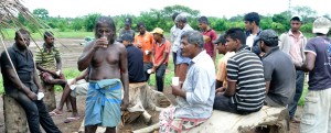 Workers take a break. Pix by Susantha Liyanawatt