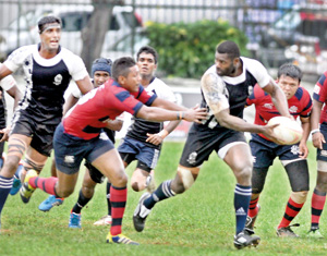 Police player Rokobo Nasoni in control over the Red Shirts at Police Park. - Pic by Ranjith Perera