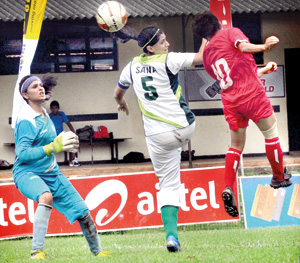 Female footballers of Nepal were on the rampage when they thrashed Pakistan by 8-0. - Pic by Amila Gamage.