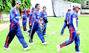 The Nepalese team takes to the field. - Pics by Ranjith Perera