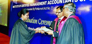 Best Overall Performance in the September 2011 examination Miss H.L.A.S. Danushka being awarded the Founder President Prof. Lakshman R. Watawala Gold Medal for Best Overall Performance in the September 2011 examinations
