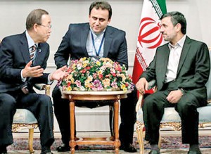 UN Secretary General Ban Ki-moon speaks with Iran's president Mahmoud Ahmadinejad upon arrival in Tehran for the NAM summit. Photograph: Reuters