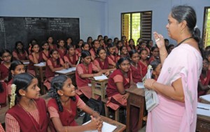 THINK POSITIVE: V. Chandra, resource person, handling an NIE session at St.Joseph’s Girls Higher Secondary School in the city. Photo: M. Moorthy