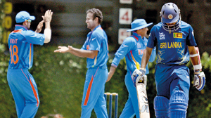 Irfan Pathan and the Indian team celebrate a Lankan wicket  - Pic by Amila Gamage