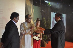 Hotel industry veteran Prema Cooray receiving an award at the Tourism Awards