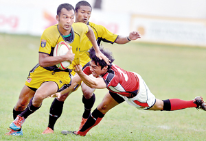 The Malaysia vs Singapore game in progress. - Pic by Ranjith Perera.