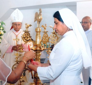 Lighting of the Traditional oil Lamp by the Principal, Reverend Sister Mercy Fernando.