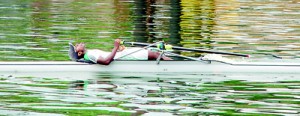 After a tiring race, an AIS oarsman