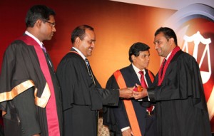 CA Sri Lanka President Mr. Sujeewa Rajapakse hands over the Associate Certificate to a new CA Sri Lanka member at the 2012 convocation in the presence of Secretary to the Ministry of Co-operatives and Internal Trade Mr. G.K.D Amarawardenaand CA Sri Lanka Chief Executive officer Mr. Aruna Alwis.