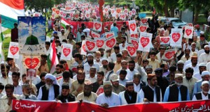Demonstrators march at a protest rally in Islamabad on September 22,  against a US-made anti-Islam film. (AFP)