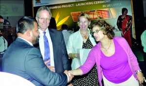 Seen here the Minister exchanges greetings with some donor agency officials. Pic by Mangala Weerasekera.