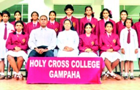 Holy Cross shuttlers dazzle