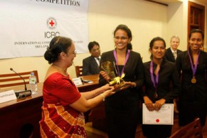 The Vice Chancellor of the University of Colombo Professor Kshanika Hirimburegama giving away the Championship trophy to APIIT National Champions.— atSenate Room, College House, University of Colombo.