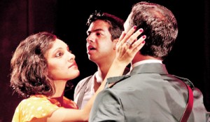 I’d be surprisingly good for you: Melanie Bibile as Evita with Mario de Soyza as Peron and  Rehan Almeida as Che in the background.  Pic by Indika Handuwala